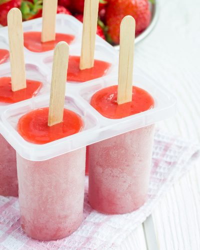 Homemade popsicles with strawberry and banana, square format